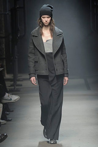gray wool jacket with black top and pants