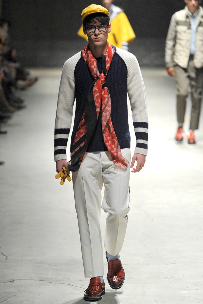 navy and white fitted sweater with tailored pants