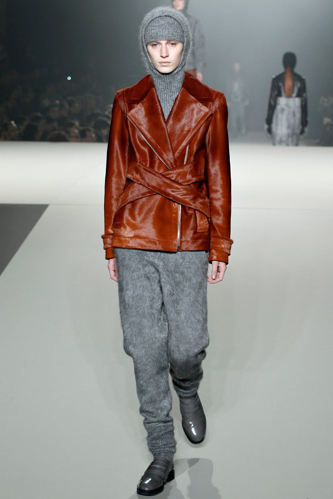 brown leather jacket gray sweater pants