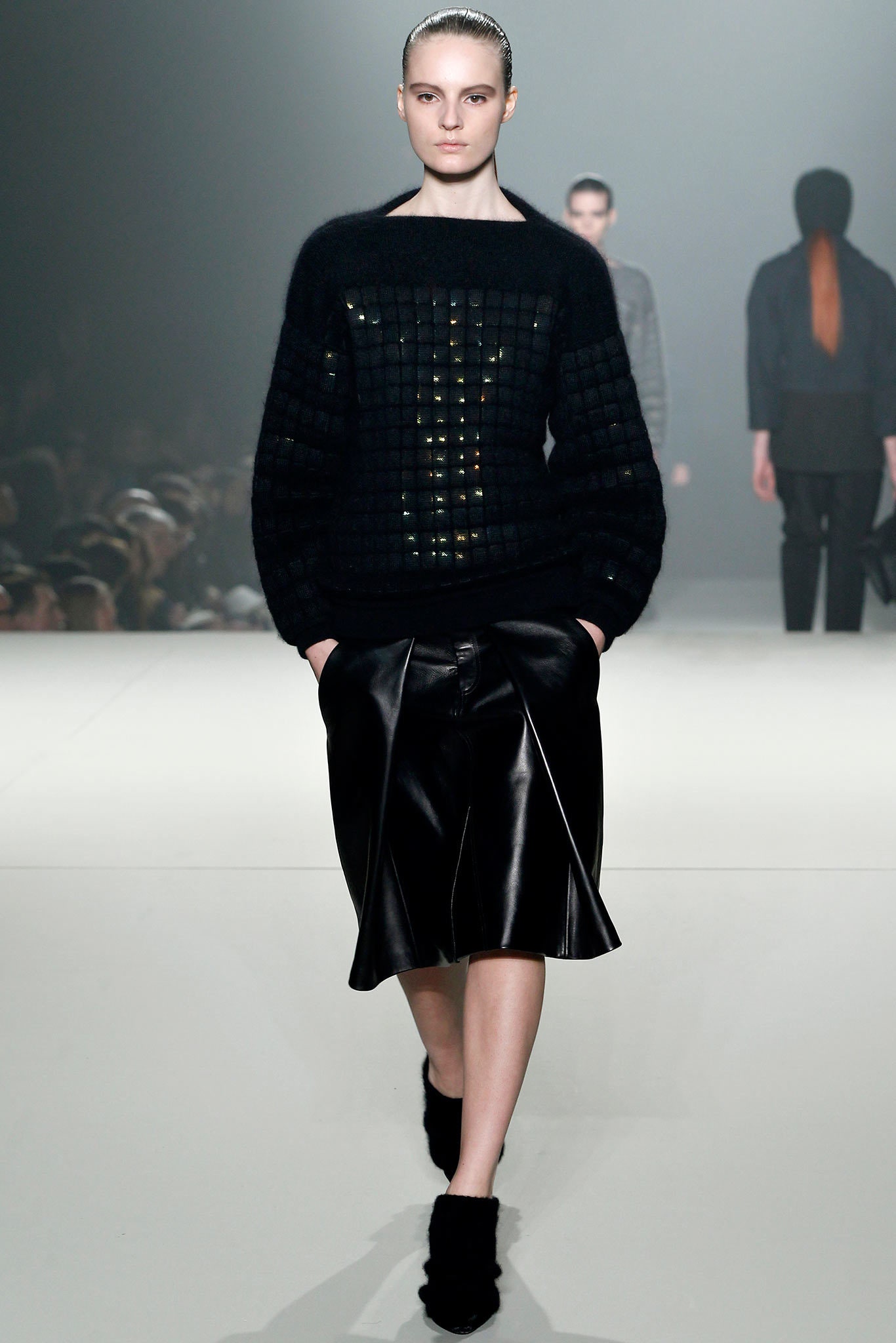 black wool sweater and leather skirt