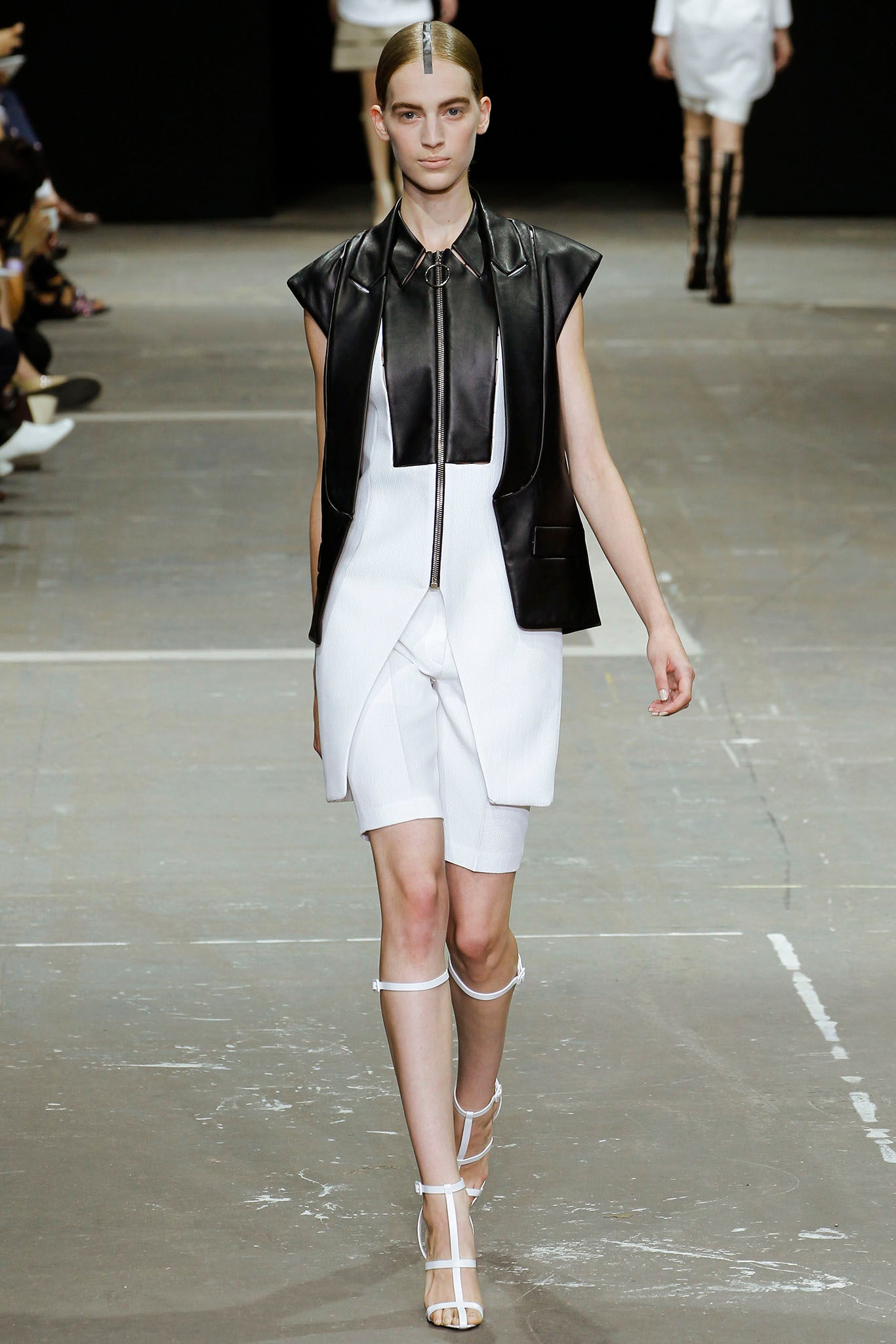 black leather sleeveless fitted structured zippered jacket