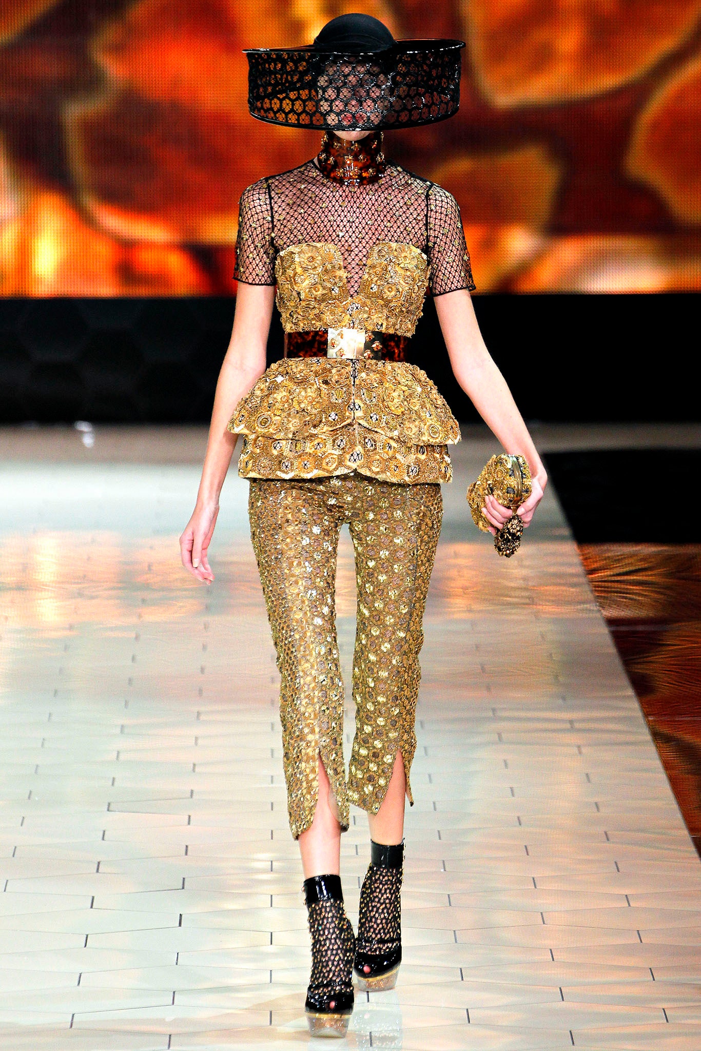 black mesh top with gold sequined pants