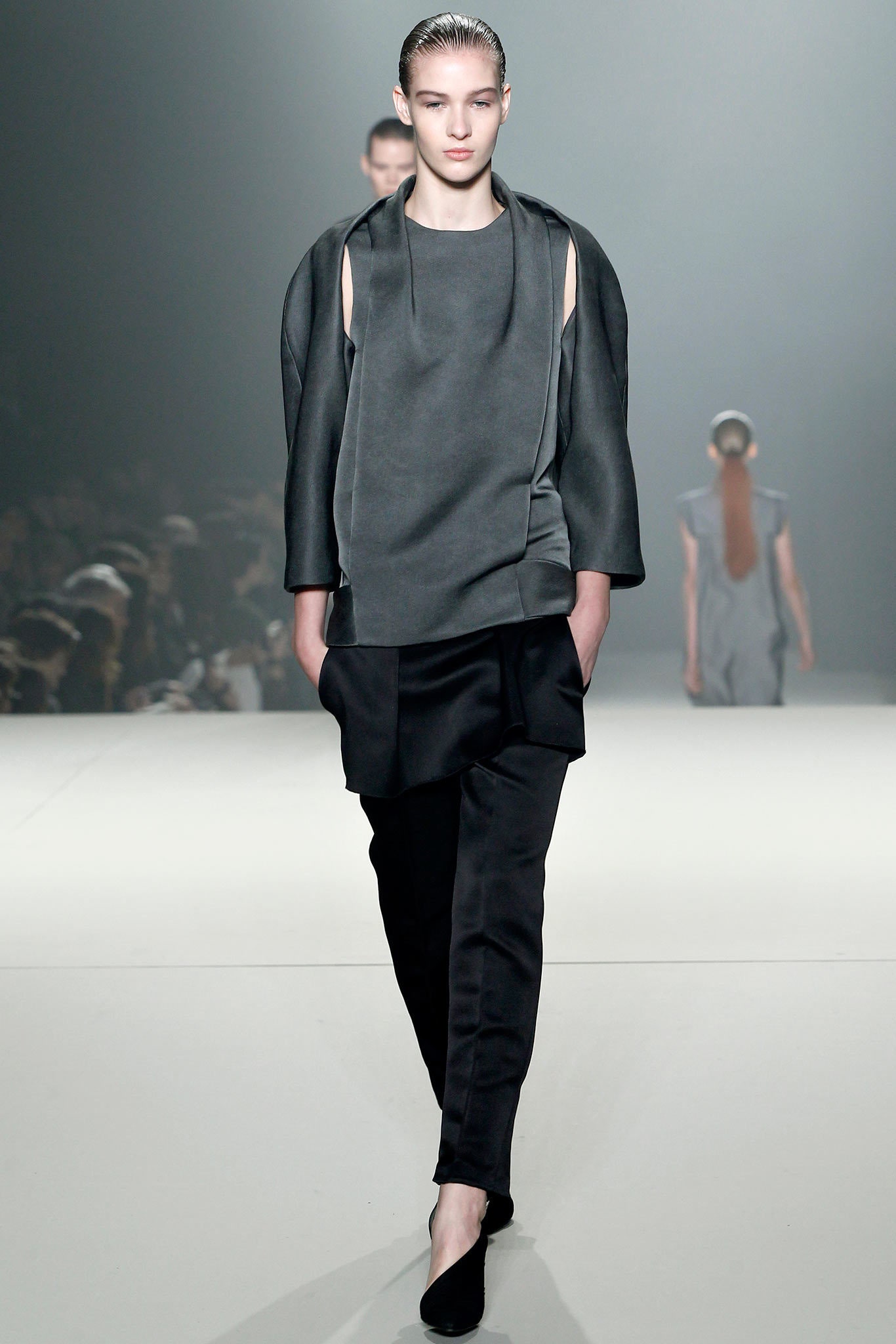gray relaxed top with black pants