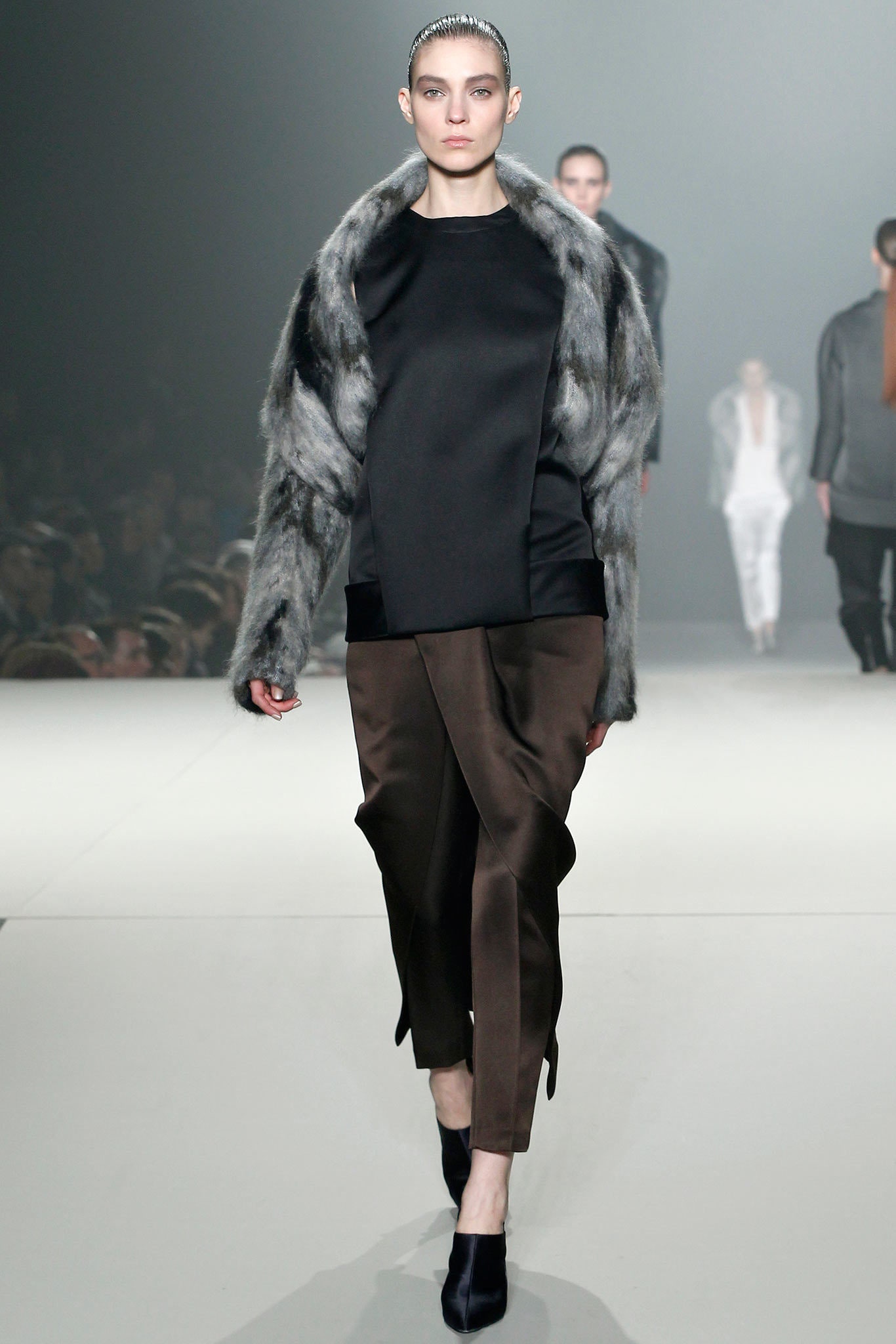black silk top with brown tailored pants