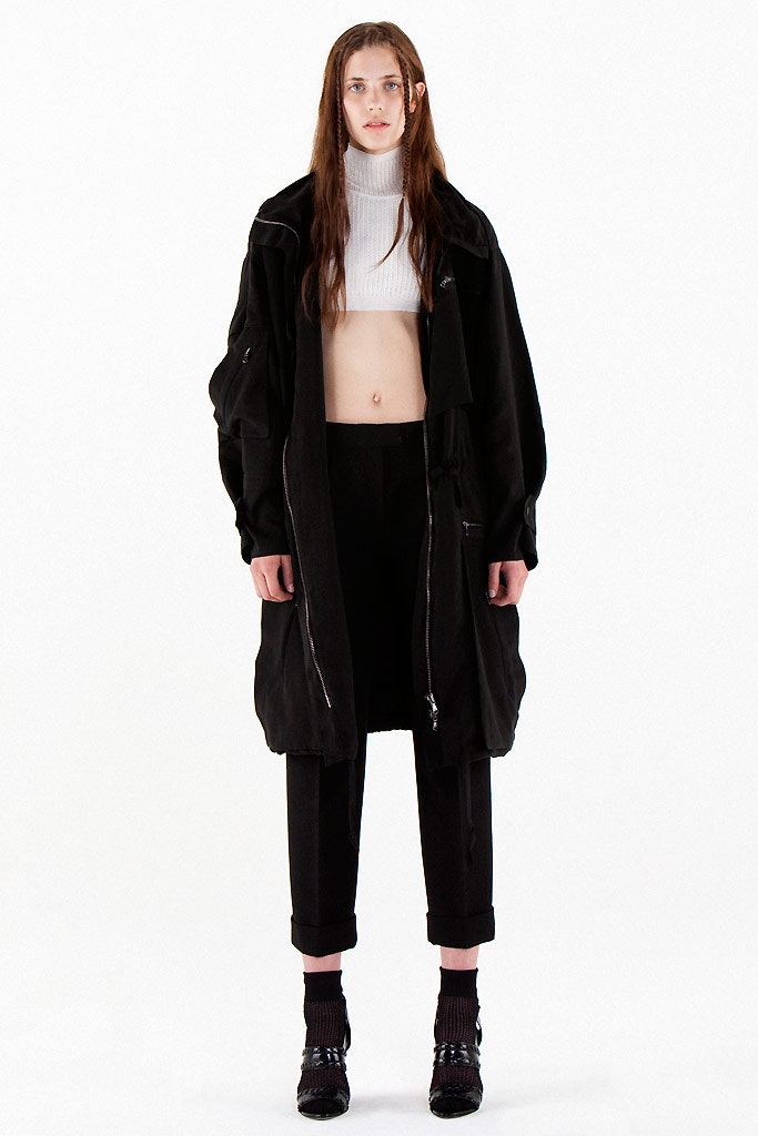 black wool coat with white top