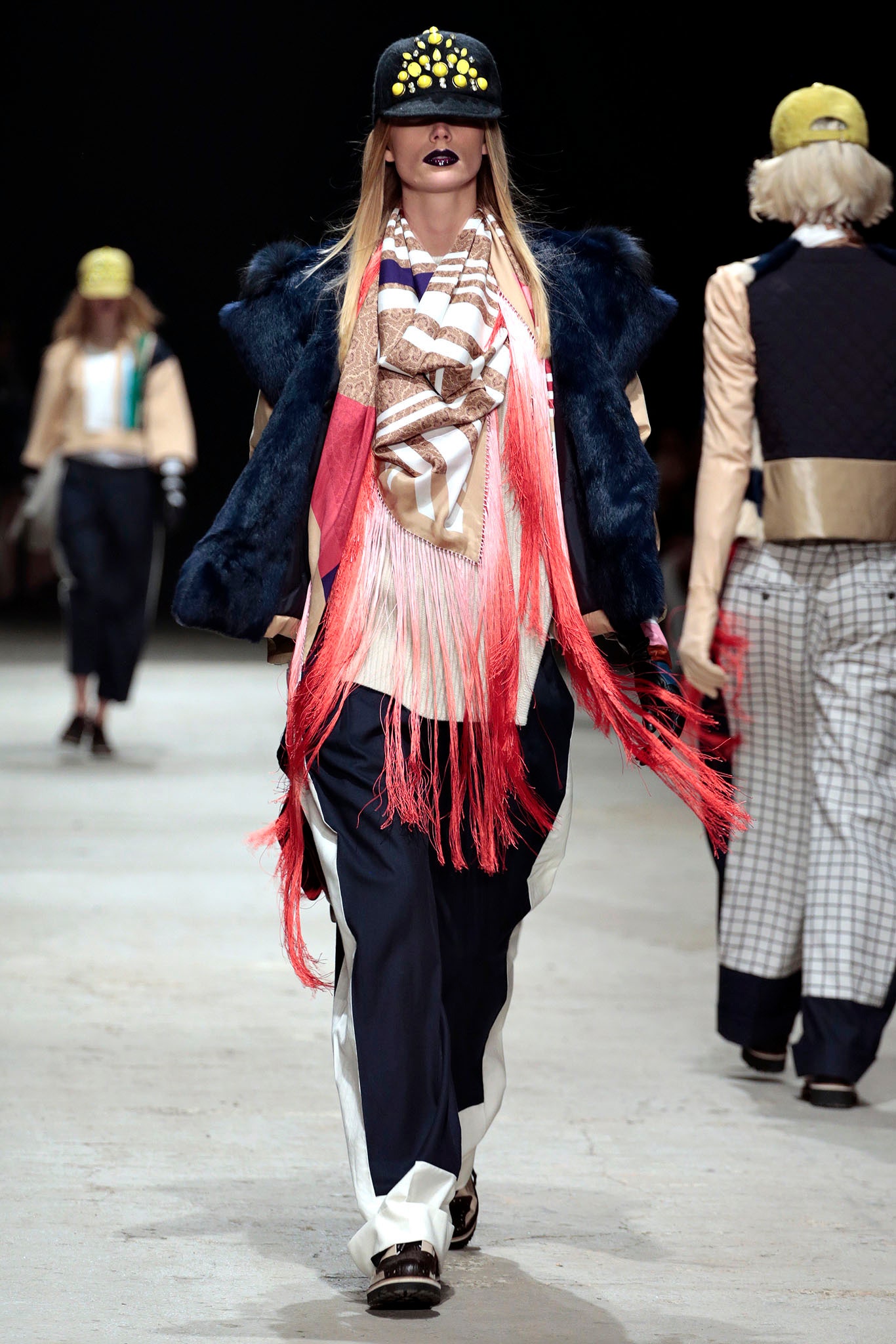 blue faux-fur jacket with fringed details