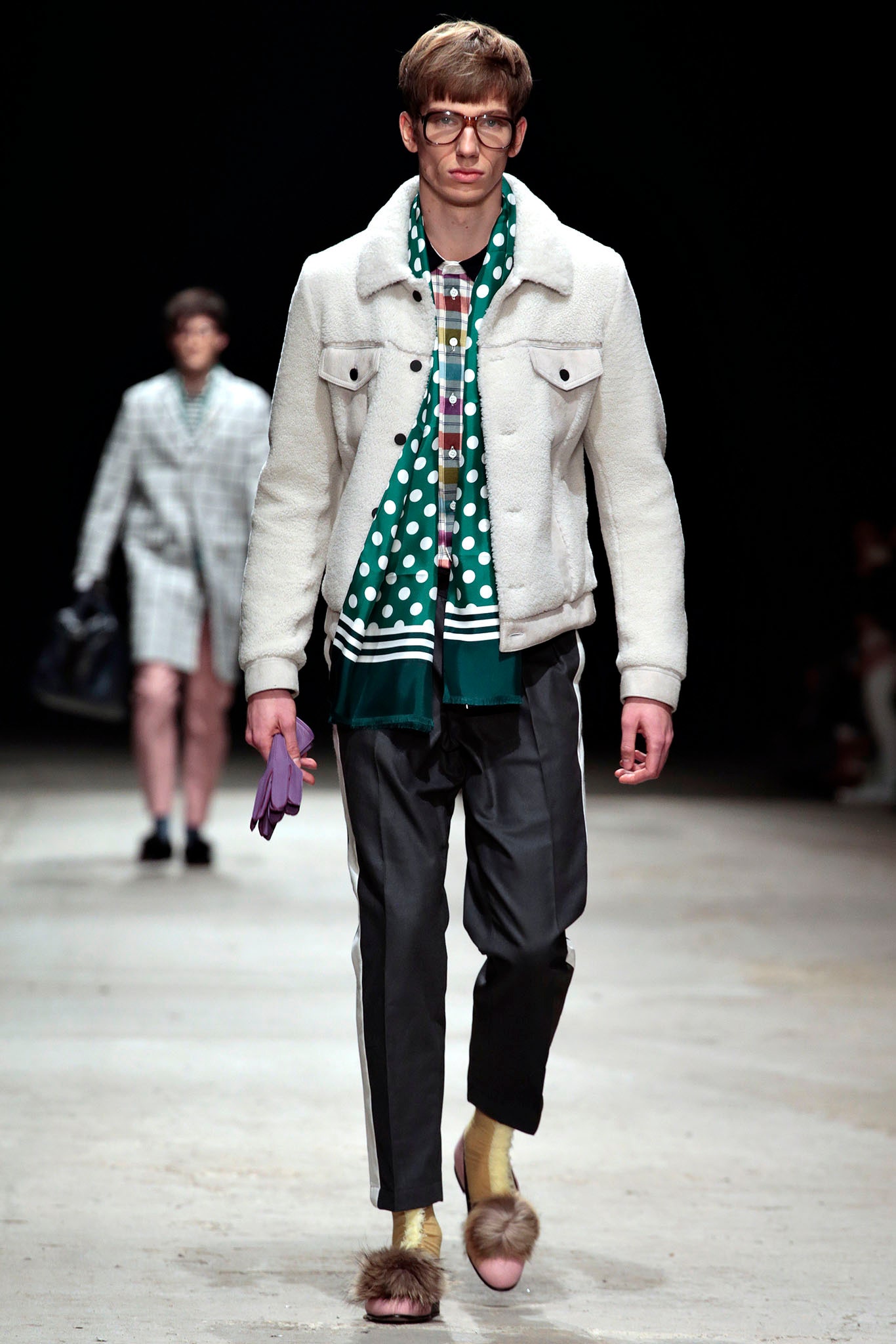 white faux-fur jacket with green shirt