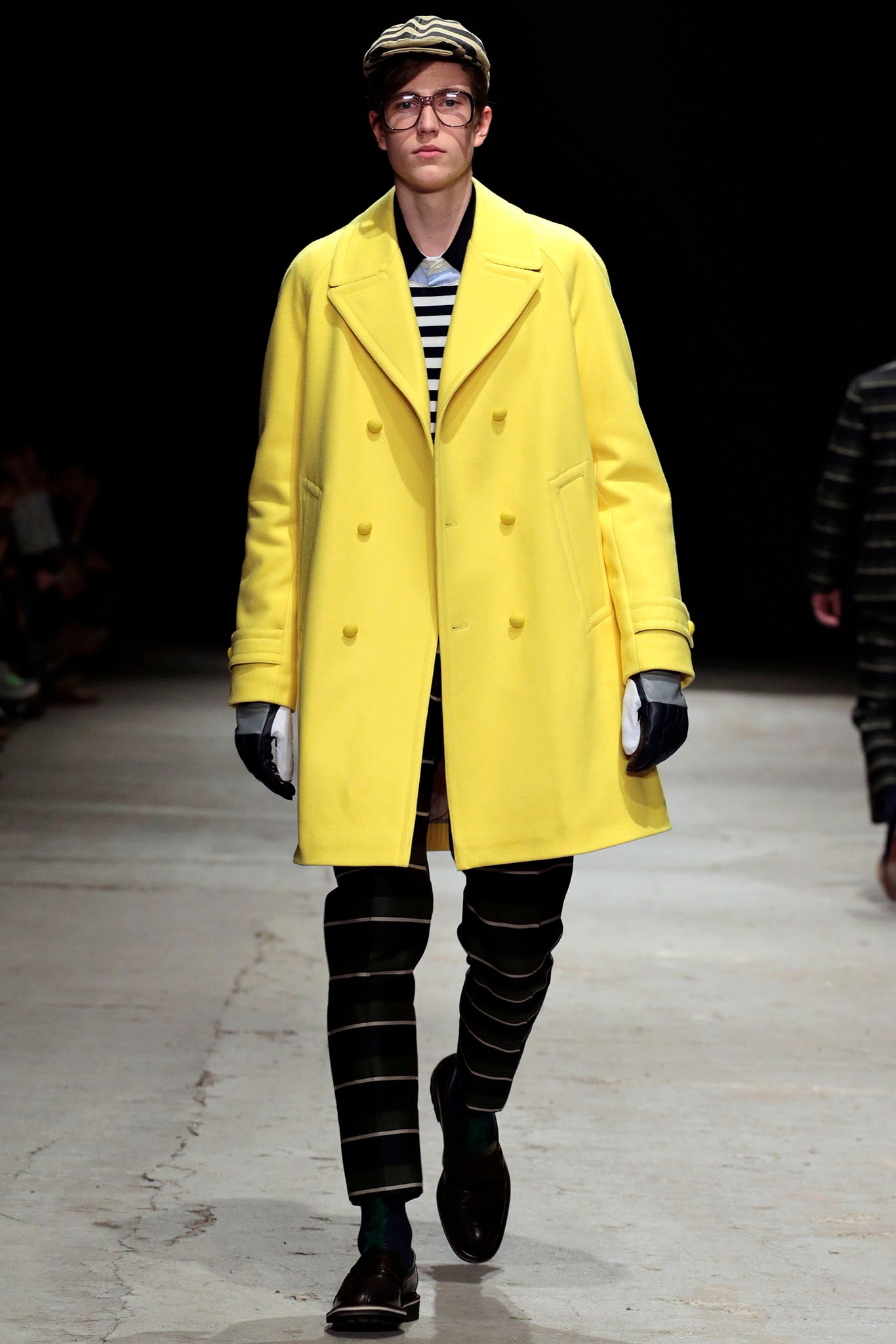 yellow coat with striped shirt
