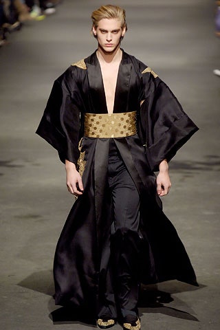 black silk gown with gold belt