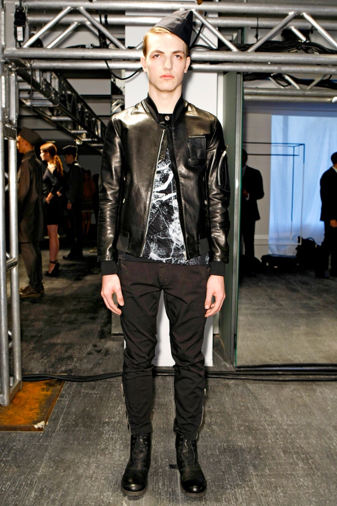 black leather jacket with printed shirt