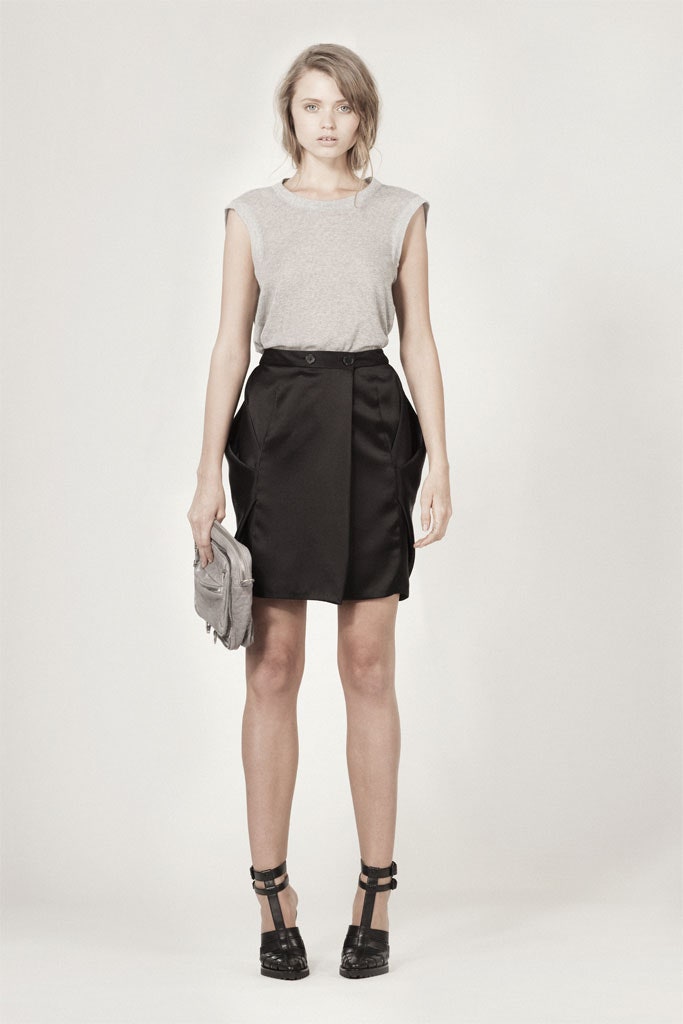 gray top and black skirt