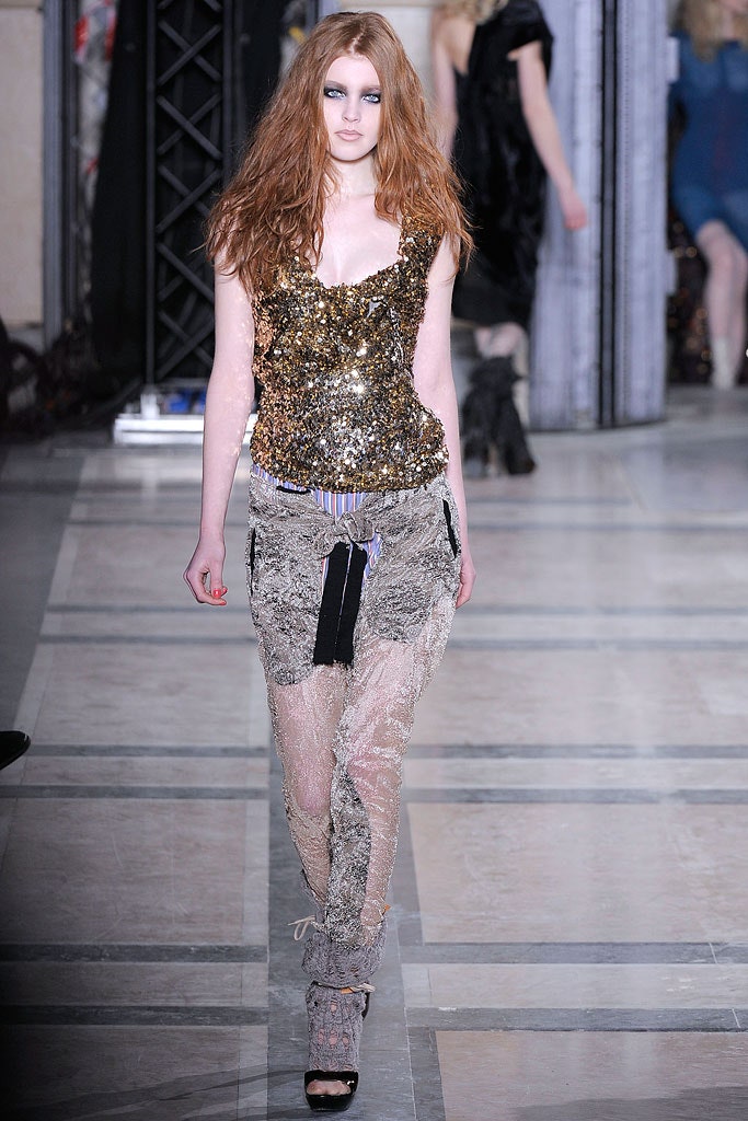 gold sequin sleeveless top and gray mesh pants