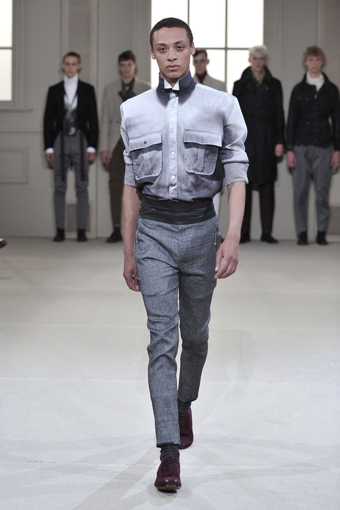fitted gray shirt and slim pants