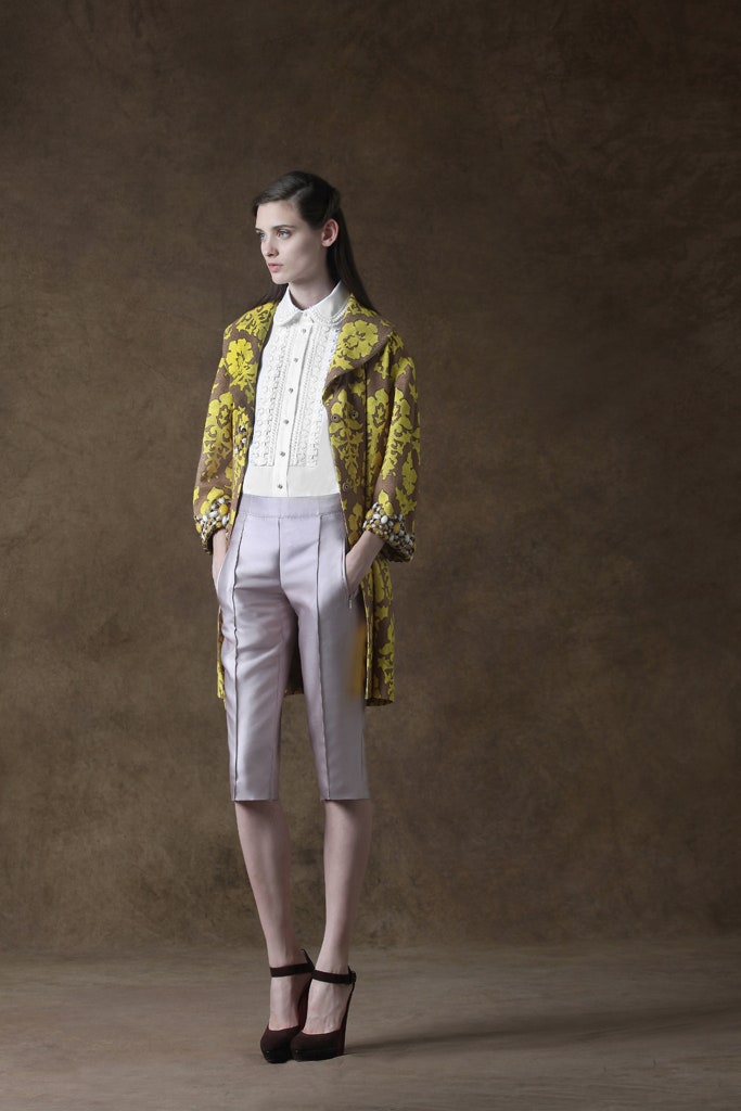 yellow floral coat with fitted blouse