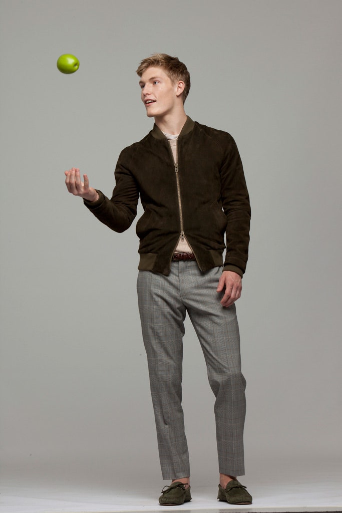 brown suede fitted jacket and gray tailored pants