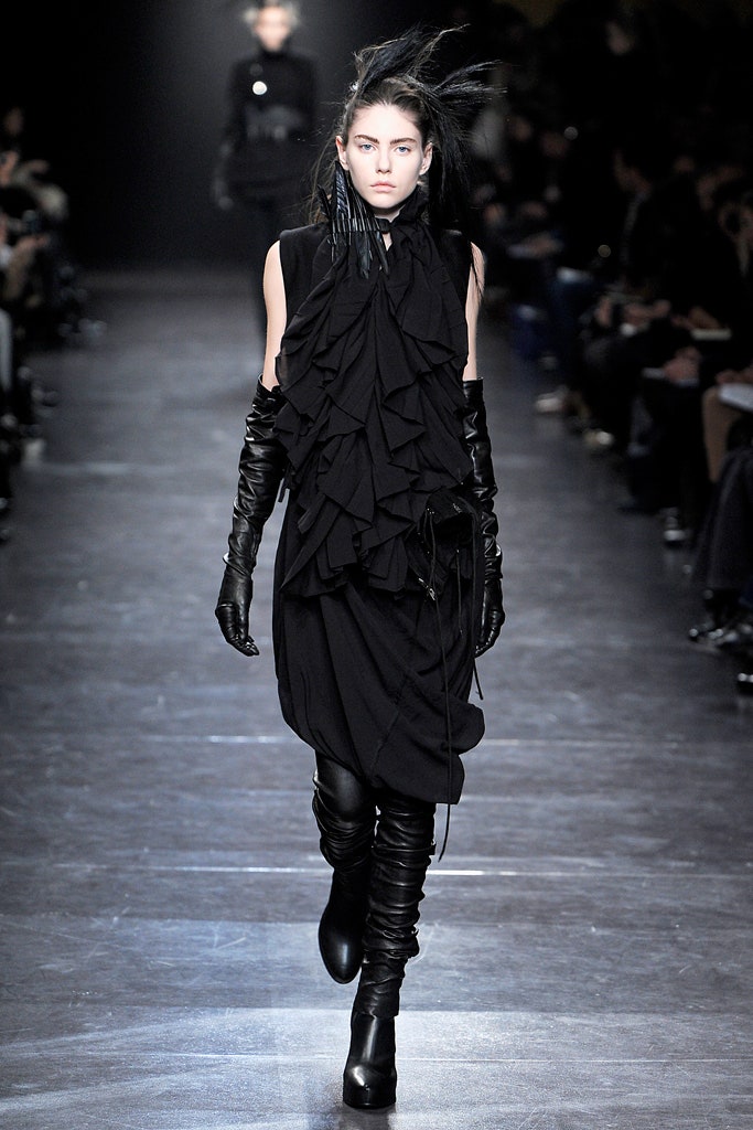 black ruffled midi dress with gloves and boots