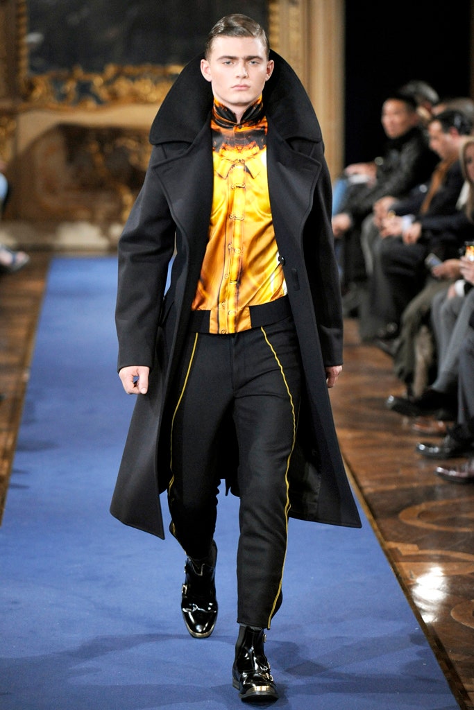 black wool coat with orange shirt