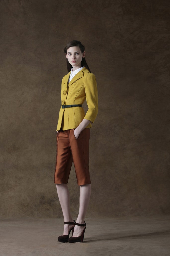 yellow tailored blazer with brown pants