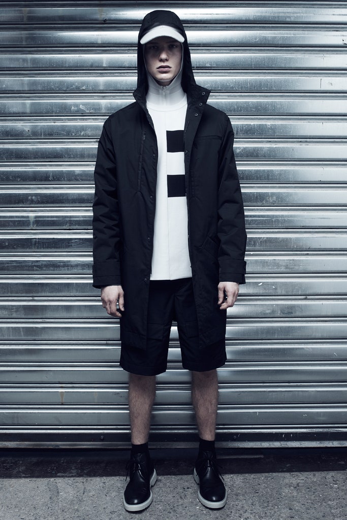 black coat with white top