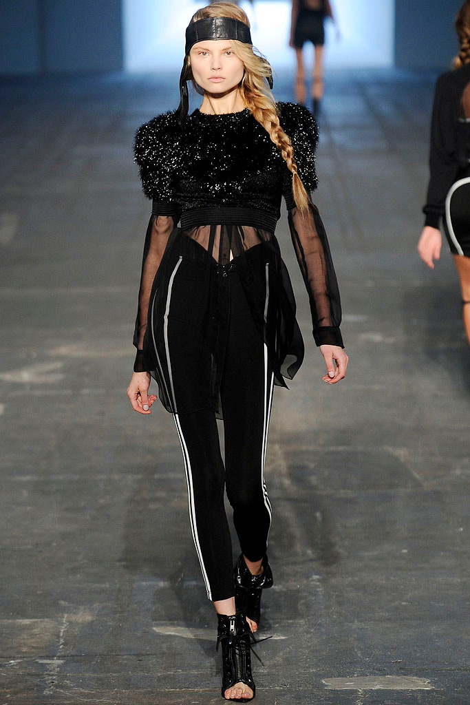 black fitted top and slim pants