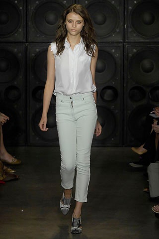 white sleeveless shirt with light blue pants