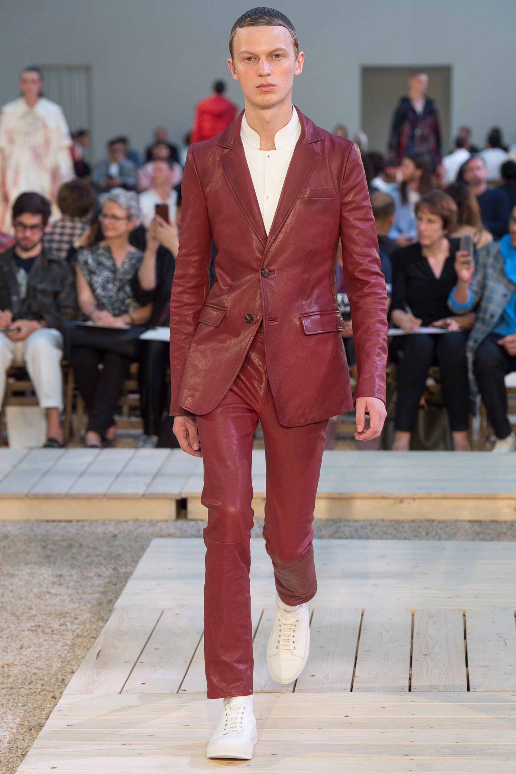 red leather long-sleeve collared fitted buttoned suit
