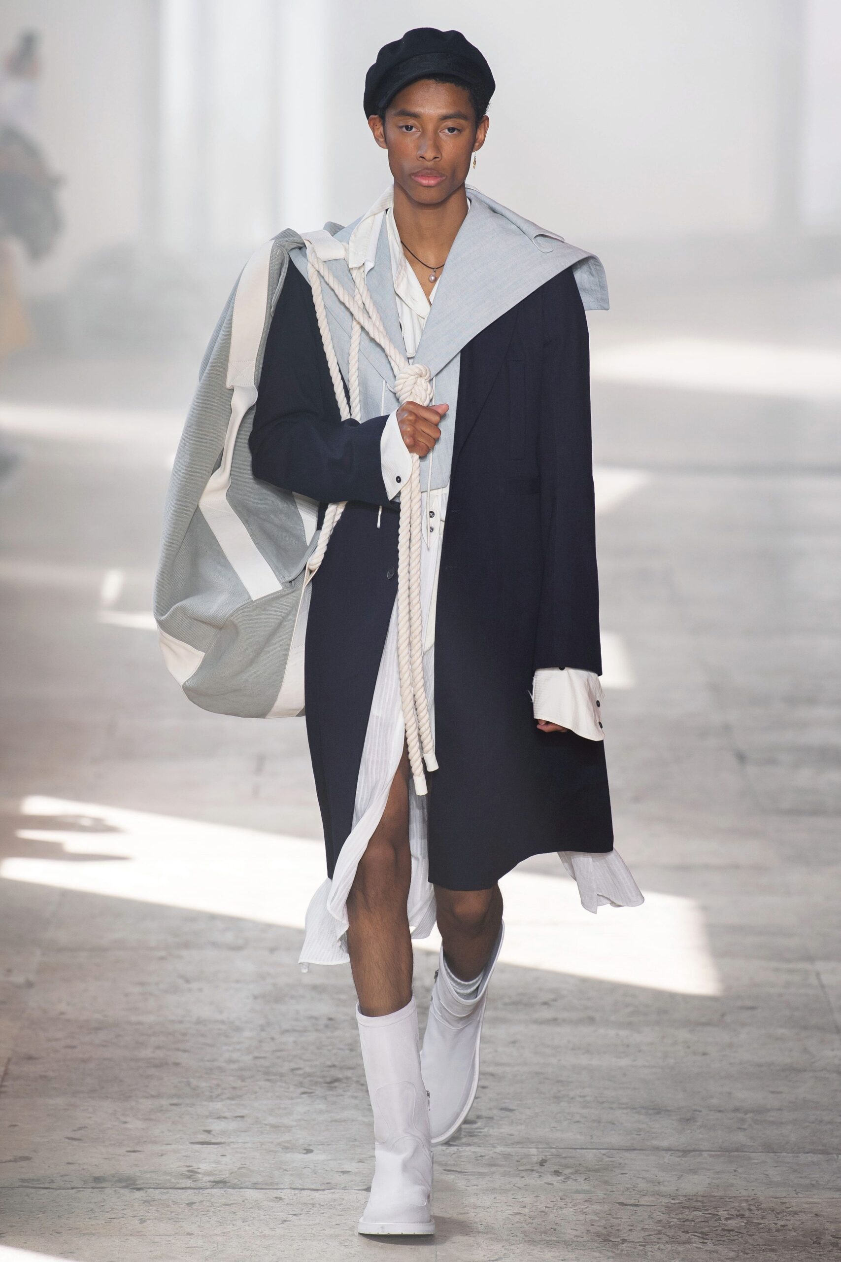 blue cotton long-sleeve collared relaxed buttoned coat