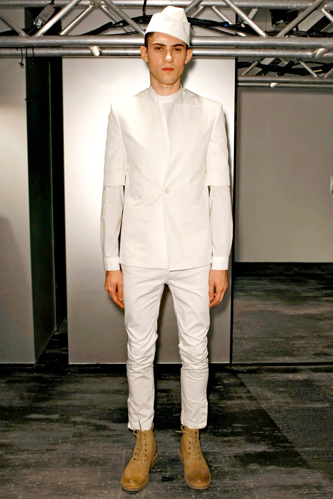 white tailored suit with brown boots