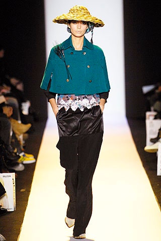 teal wool cape with black pants