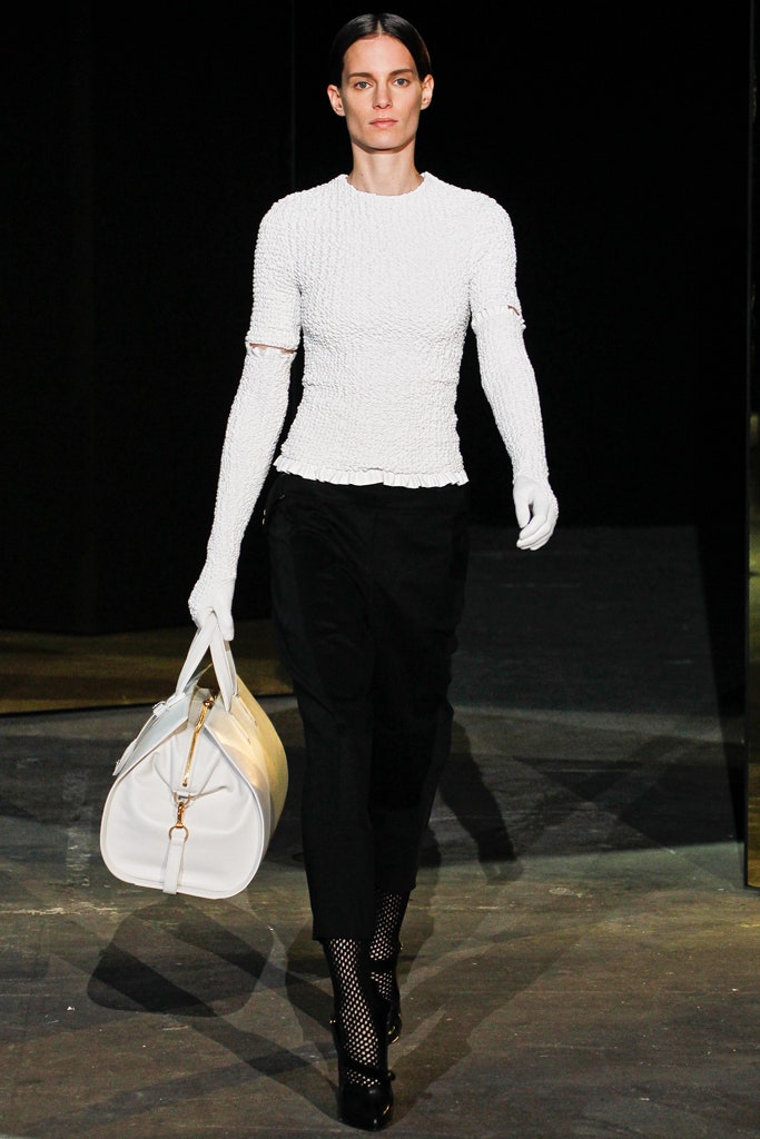 white fitted top with black pants