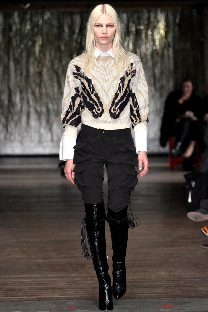 beige black embroidered sweater with ruffled pants