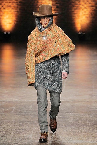 relaxed wool poncho with fitted sweater