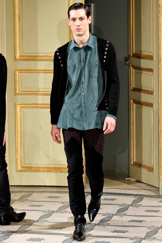 fitted green shirt with black jacket