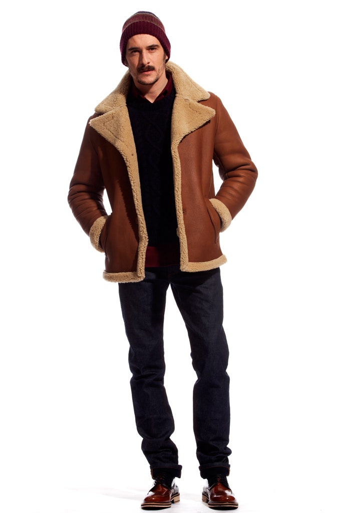 brown leather jacket with black sweater