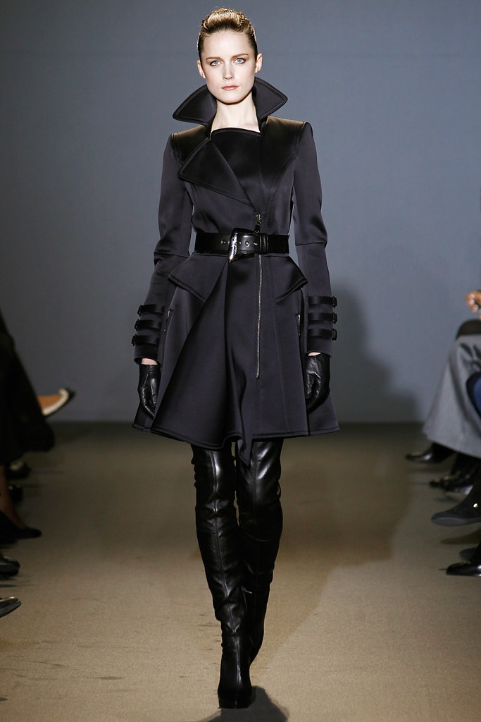 black fitted coat with gloves and boots