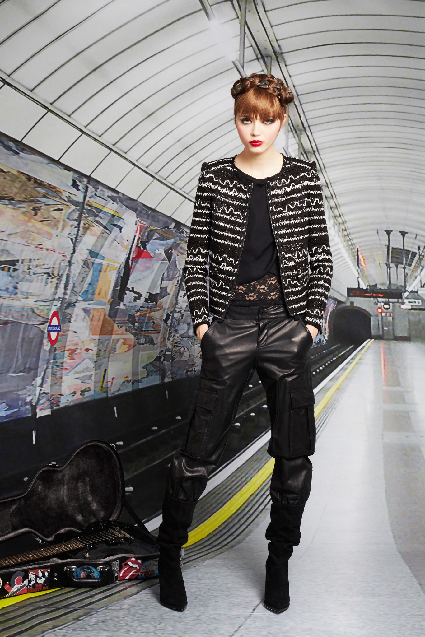 black embroidered jacket and leather pants