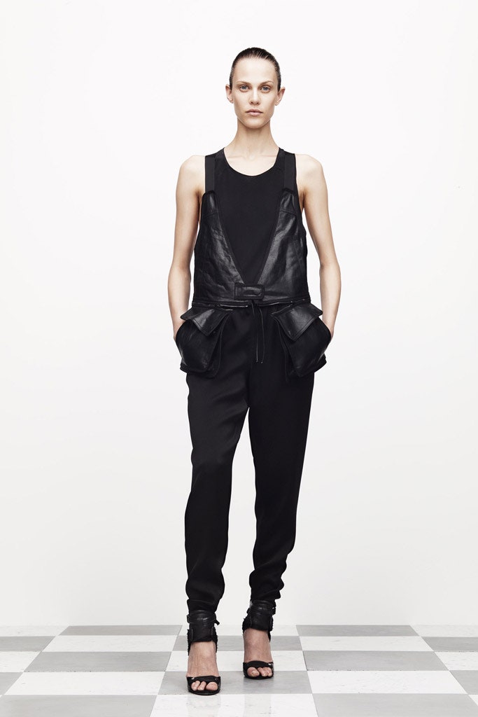black leather sleeveless top with relaxed pants