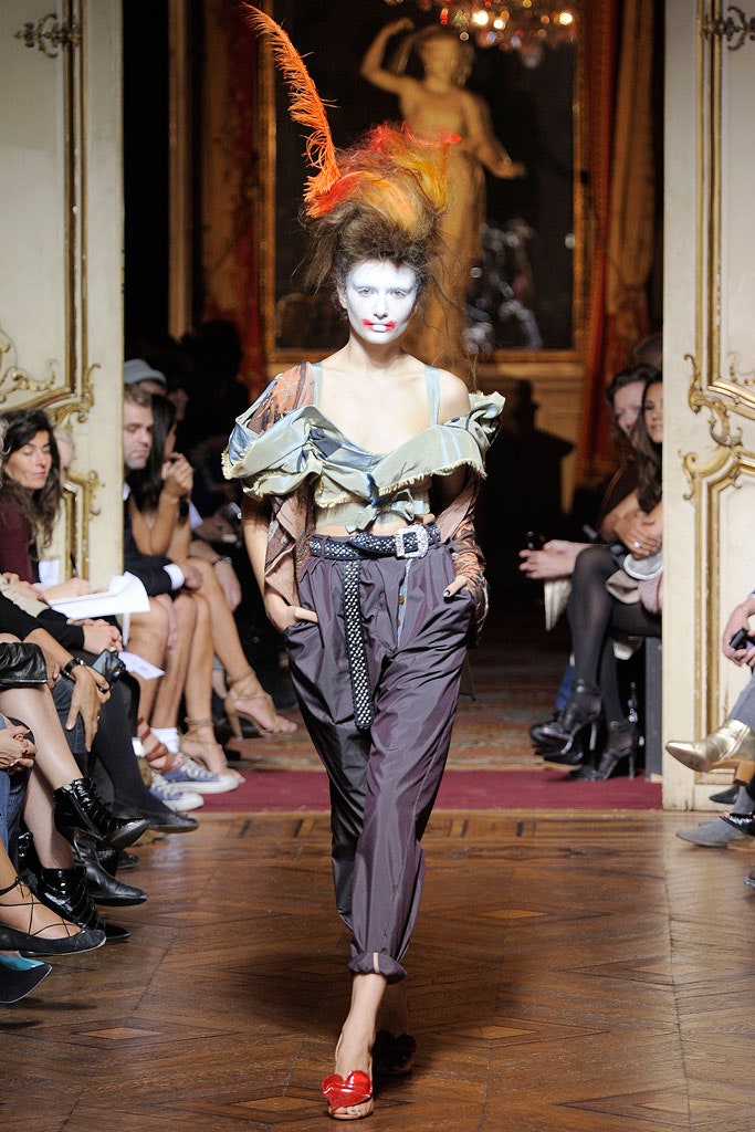 blue off-shoulder top with gray pants