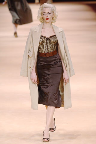 beige wool coat with gold corset