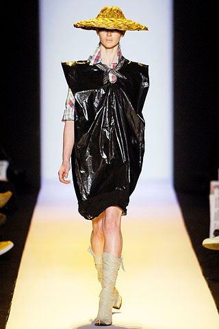 black vinyl relaxed dress with gold hat