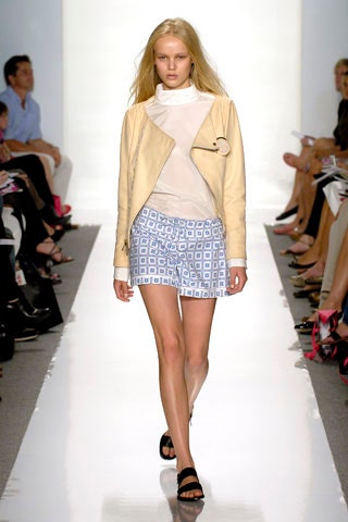 beige leather jacket with white top