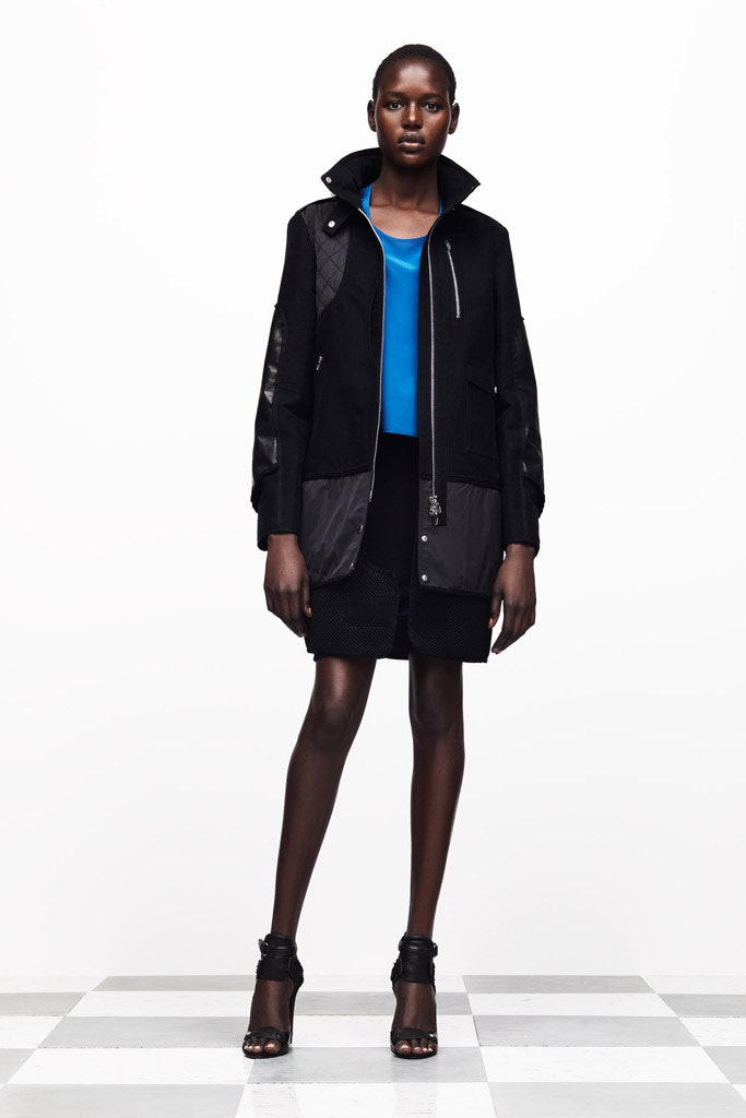 black jacket blue top black skirt
