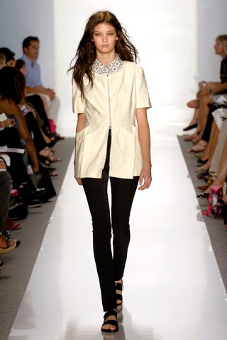 white collared blouse and black pants