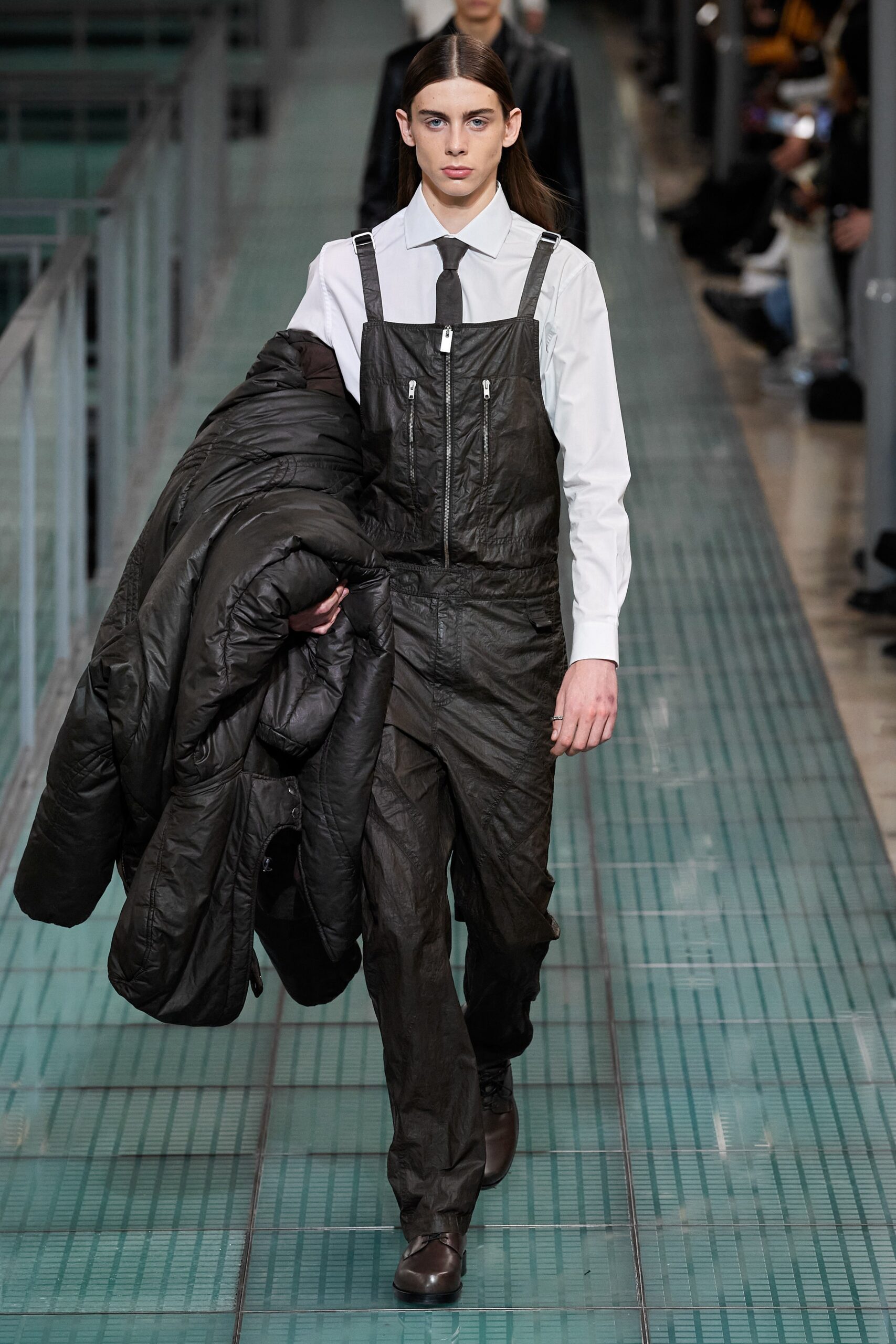 black leather jumpsuit with oversized coat