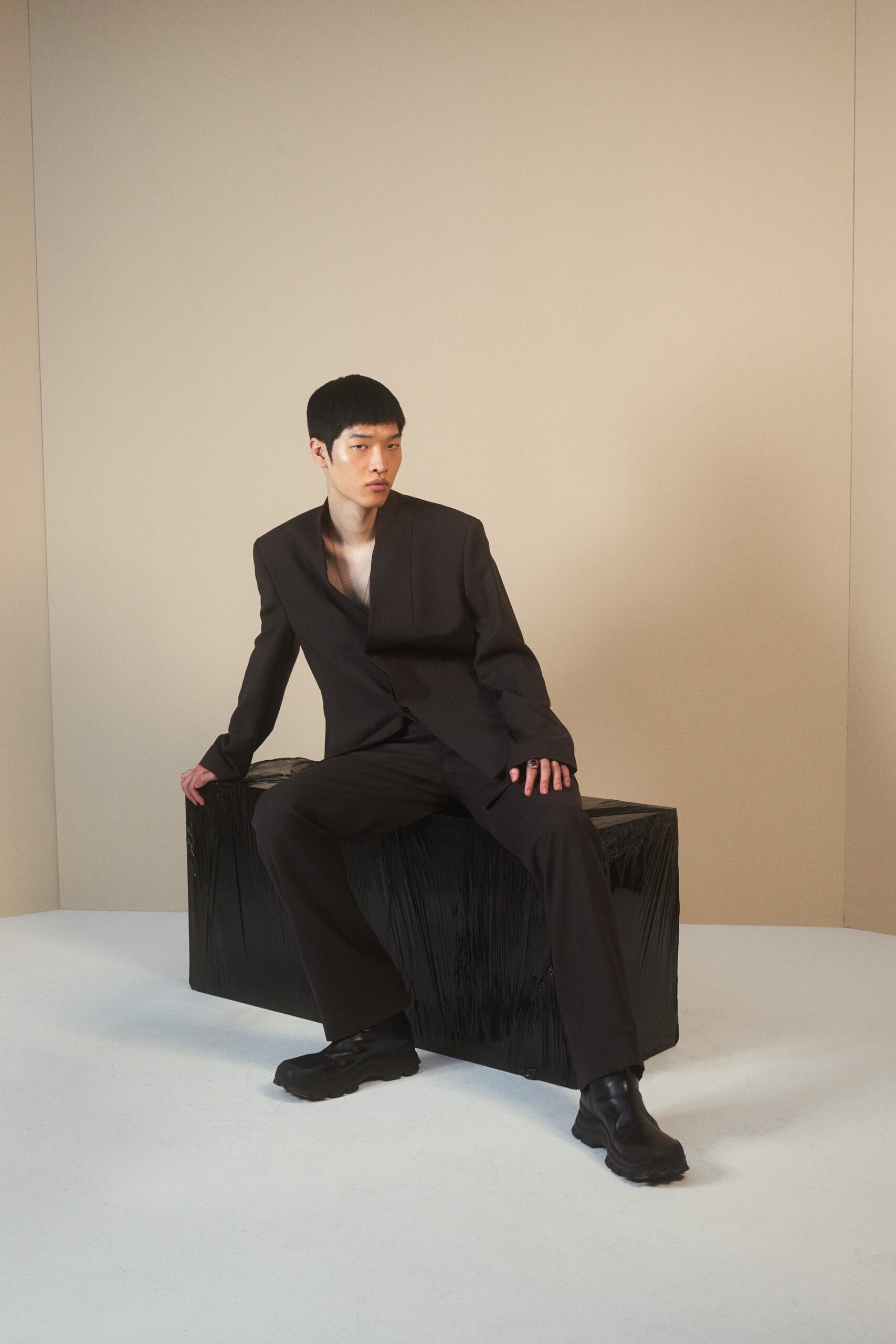 black tailored suit with chunky shoes