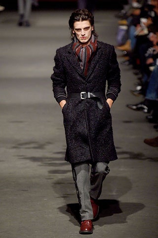 black wool coat with gray pants