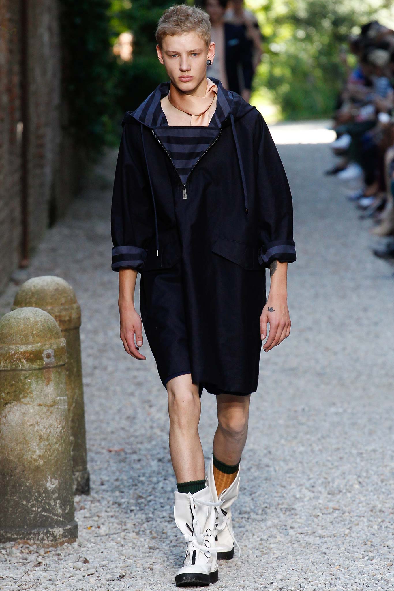black coat and fitted dress