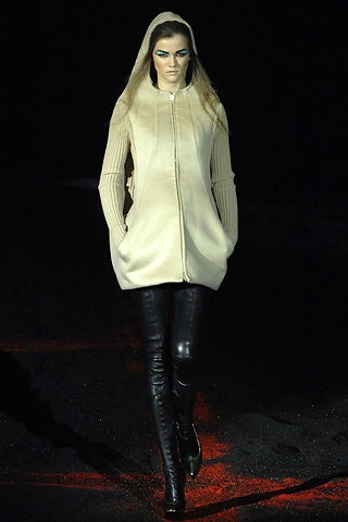 beige hoodie with black leather pants