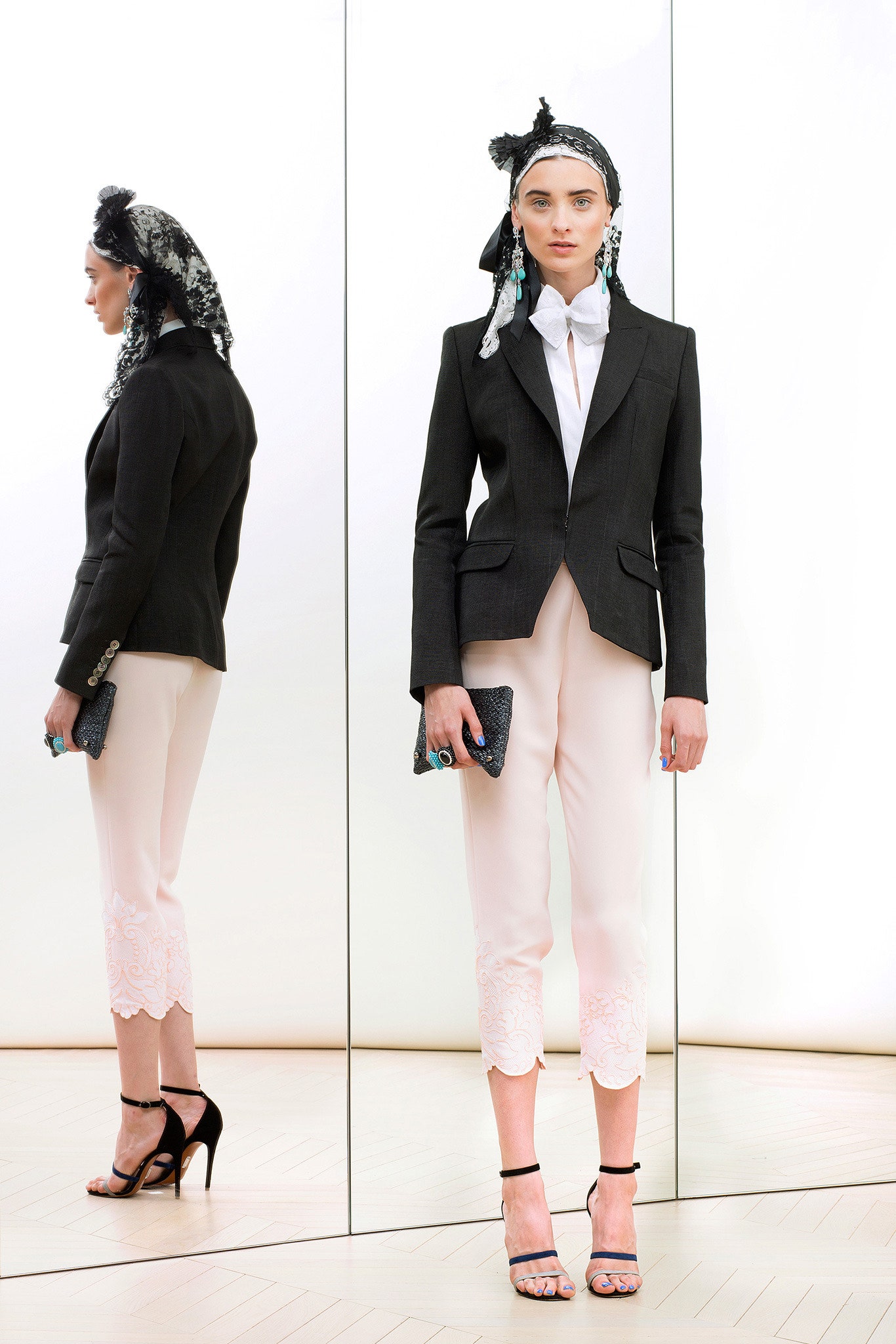 black tailored blazer with white pants