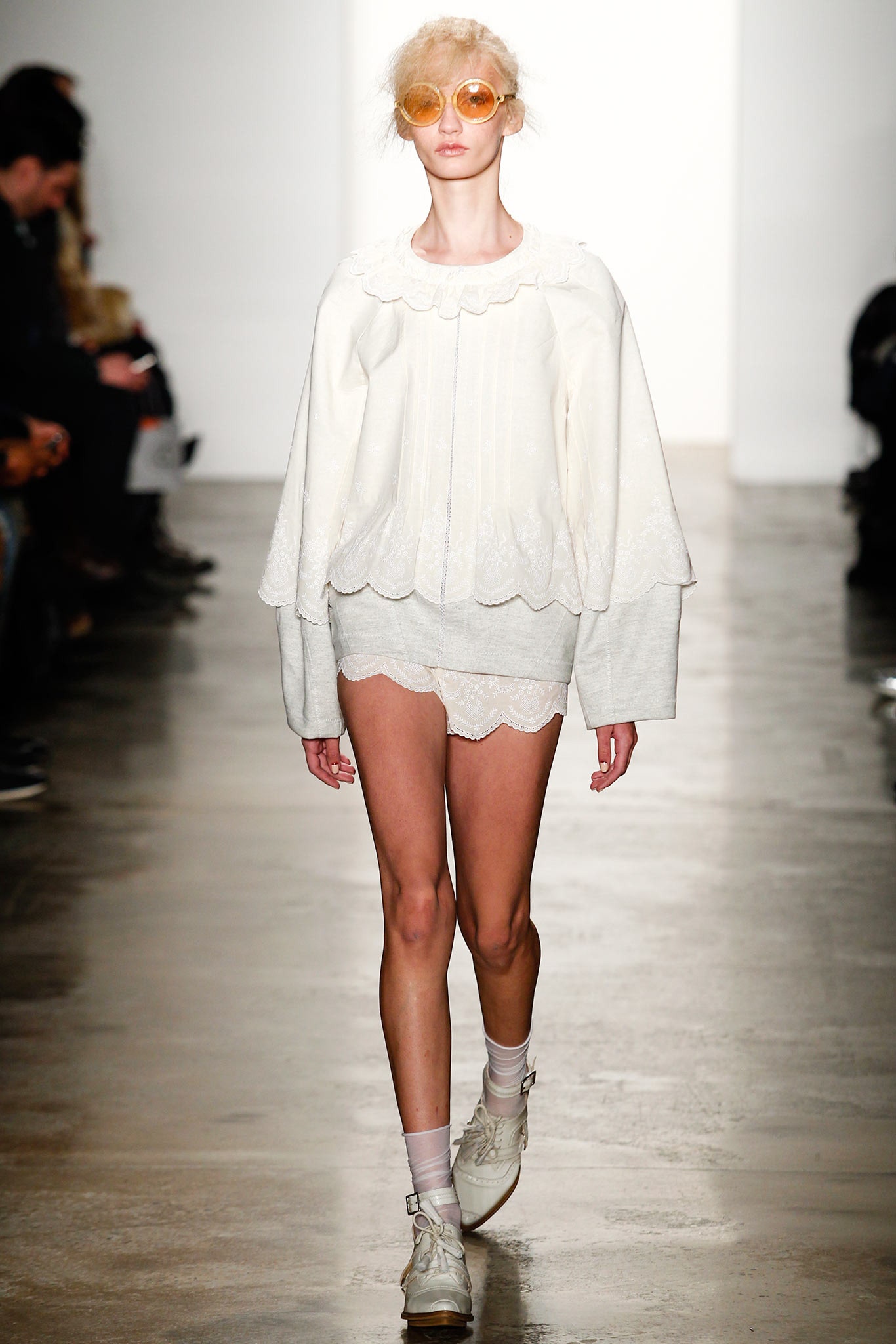 white relaxed top with scalloped shorts